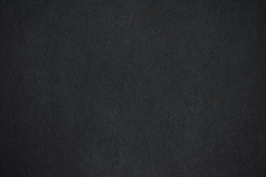Soyut siyah kumaş dokusu arka planı veya koyu gri kumaş dokusu arka planı vignette etkisi ile