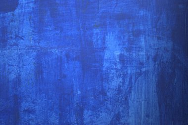Grunge doku arka planı. Duvar maviye boyanmış.