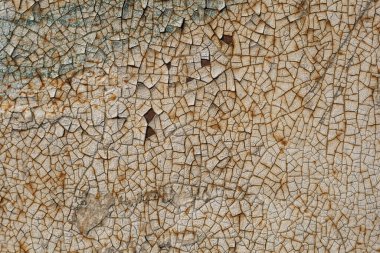 Paslı metalin üzerindeki eski çürümüş boya.