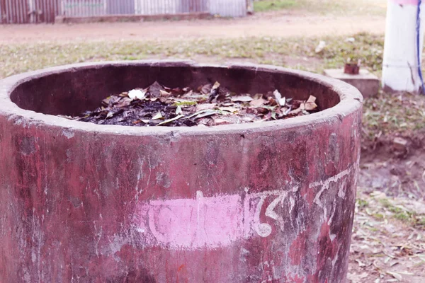 Street Dustbin Beside on Road for Public Uses. trash cans dust bins on the pavement of the public park.Trash and disposal of unused goods.cement concrete Dustbin in Bangladesh — стокове фото