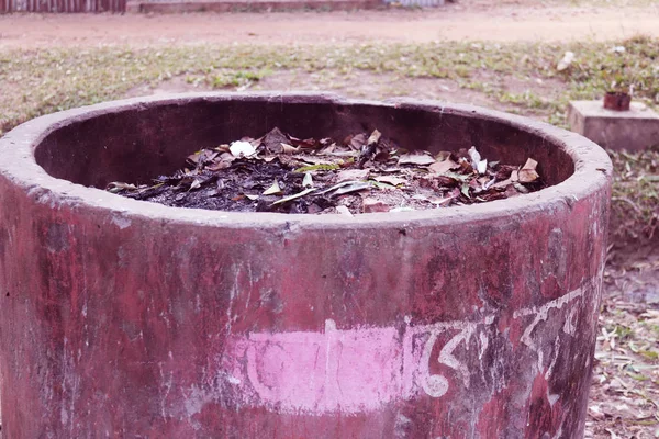 Street Dustbin Beside on Road for Public Uses.Trash cans dust bins on the pavement of the public park.Trash and disposal of unused goods.cement concrete Dustbin in Bangladesh