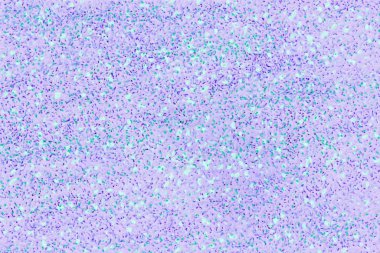 Açık arkaplanda çok renkli küçük noktalar.