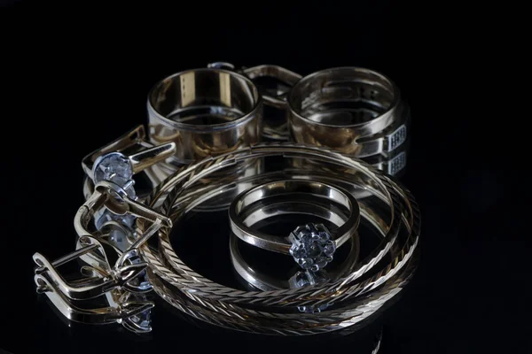 Jewelry on a black background. — Stock Photo, Image