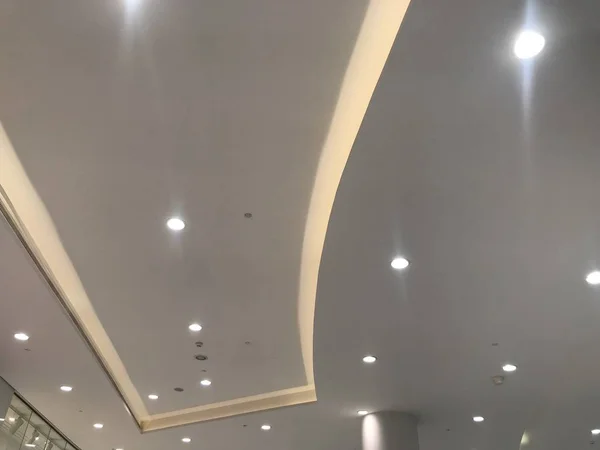 A Gypsum ceiling view images emulsion white painted and gypsum coves painted with White color painted emulsion to look more decorative ceilings design and called as gypsum false ceiling or Suspended