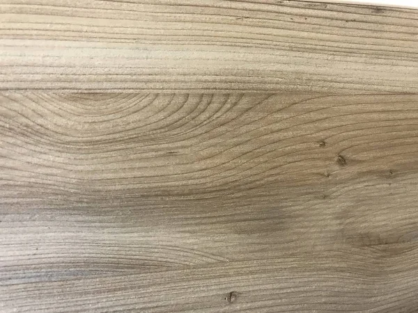 Eine fertig polierte Holzmaserung über einer laminierten oder furnierten Oberfläche für eine Tischplatte für eine Schreinerei im luxuriösen Look eines Einkaufszentrums — Stockfoto