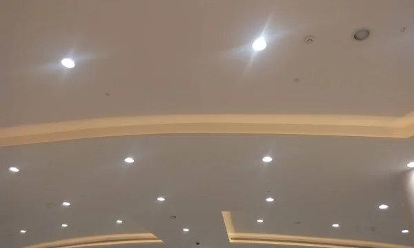 Emulsion painted suspended gypsum false ceiling and Gypsum coves for an shopping mall or an commerical public building