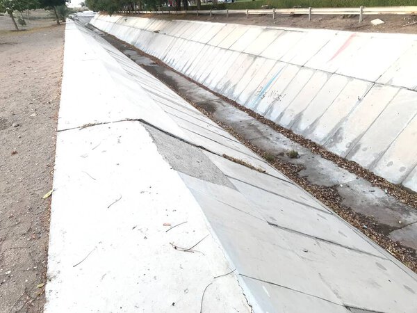 trapezoidal section storm water drainage made of concrete tiles for an metro city waste disposal system