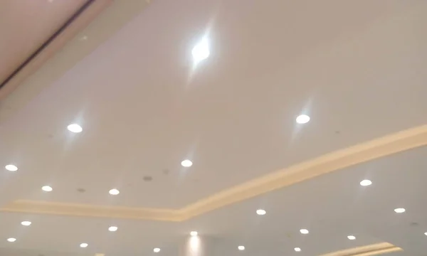 Emulsion painted suspended gypsum false ceiling and Gypsum coves for an shopping mall or an commerical public building