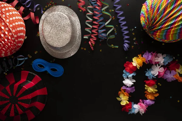 Carnival Objects Black Background Coiled Streamers Hats Confetti Many Other — Stock Photo, Image