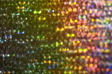 Soyut bulanık arkaplan rengi. Noel duvar kâğıdı. Çok renkli ışıldayan ışıklar. Bokeh geçmişi. Soyut çok renkli ışık.