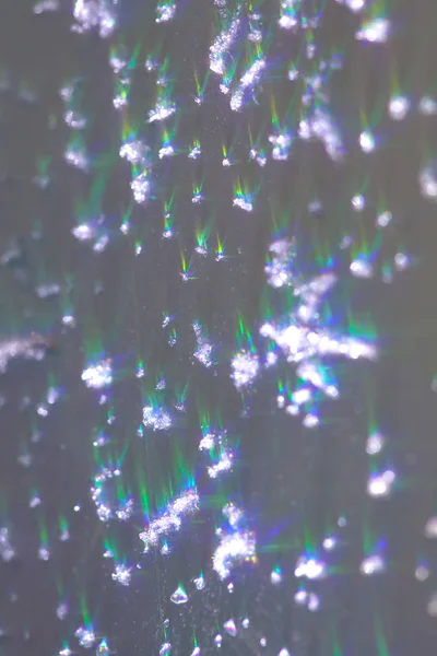 Θολή μαλακή φόντο με ολόγραμμα glitter. Μια αφηρημένη εικόνα φόντου εμπνέει. Ελαφρύ bokeh υφή φόντου. Όμορφο εορταστικό χριστουγεννιάτικο φόντο για το σχεδιασμό συγχαρητήρια. — Φωτογραφία Αρχείου