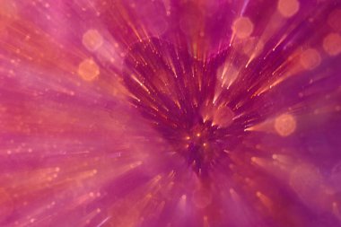 Abstract defocused background. Violet-lilac background with bokeh and hearts. Motion effect. Valentine's day concept romantic red bokeh valentines background. Art image, copy space.