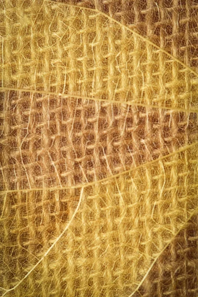 Abstract tan background. Minimalism.Burlap macro texture. Sackcloth texture with or background from natural fabric bags. Presentation concept for organic product or sackcloth crafts. For packing. — Stockfoto