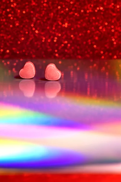 Hearts on hologram glitter background. Fantastic background for text, design, backdrop. Glitter heart and bokeh. Romantic abstract valentine background. Valentine's day concept, copy space. — Stok fotoğraf