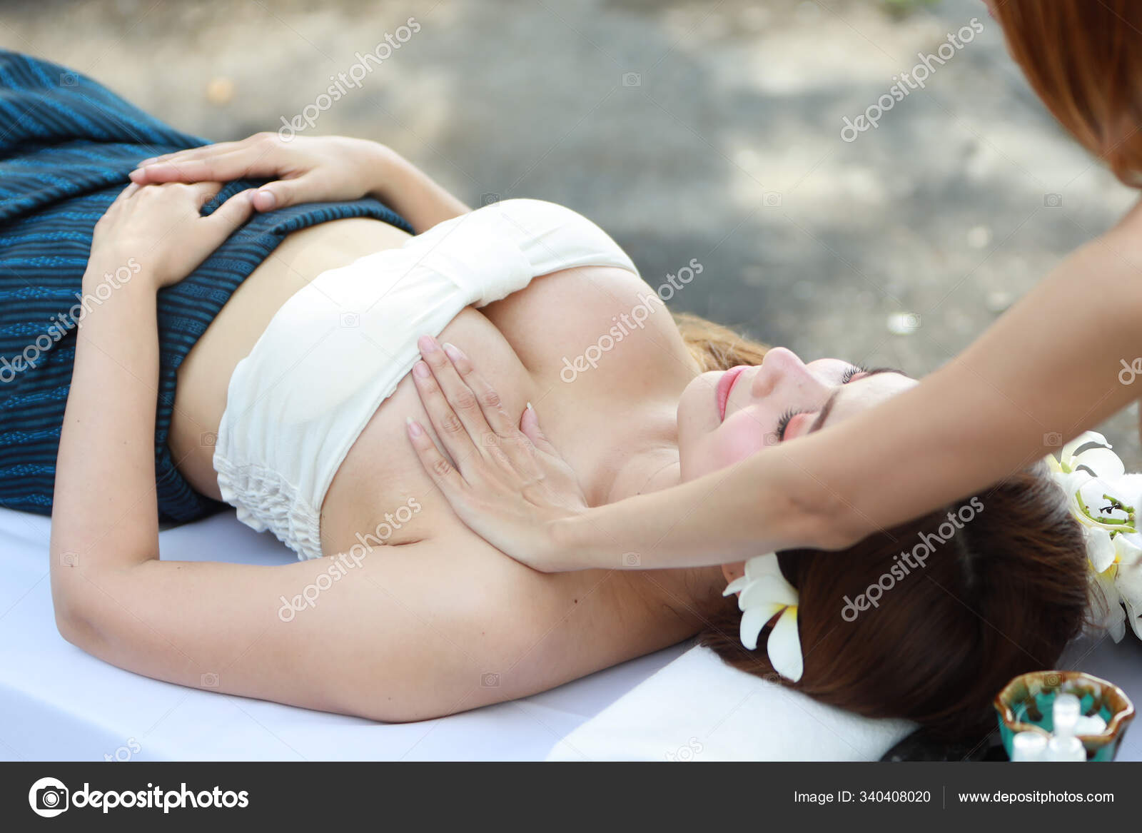 Lesbians massaging breasts