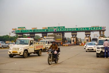 india- rajasthan- highway- 28 november 2019, vehicles on toll booth clipart