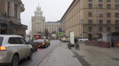 Moscow / Russia - February 02 2020: Cars go to the First Tverskaya-Yamskaya street from the Orujeyniy lane. Triumphalnaya Square. Cloudy winter day in Moscow.