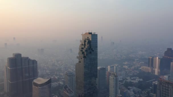 Drone shot of King Power MahaNakhon Tower and other skyscrapers in Bangkok, Thailand — Stock Video