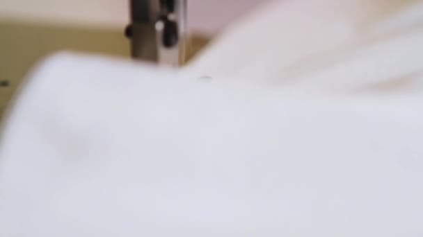 Close up shot tof the foot of a sewing machine in use — 图库视频影像