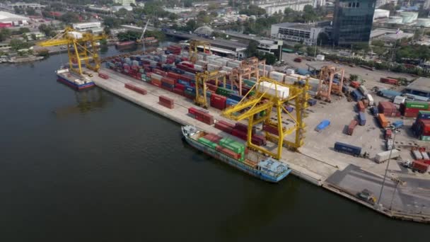 Drone shot panning round shipping container port cranes in Bangkok — Stock Video