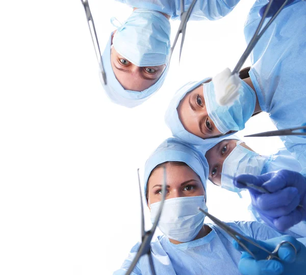 Chirurgen-Team, Frauen in Schutzuniformen, Mützen und Masken — Stockfoto