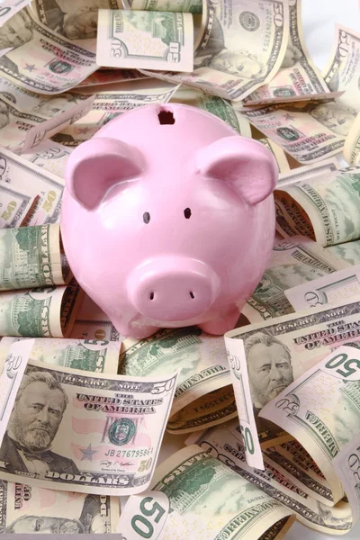 Piggy bank style money box on background with money american hundred dollar bills — Stock Photo, Image