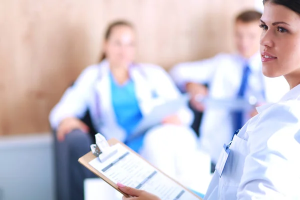 Happy medical team discussing and working together — Stock Photo, Image
