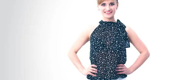 Portrait of an attractive young woman standing with crossed arms — Stock Photo, Image