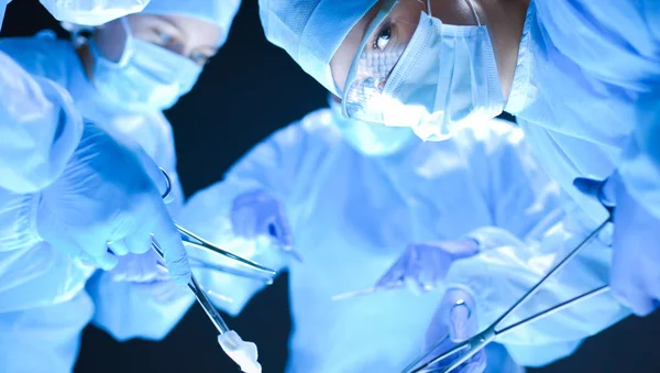 Team surgeon at work on operating in hospital — Stock Photo, Image