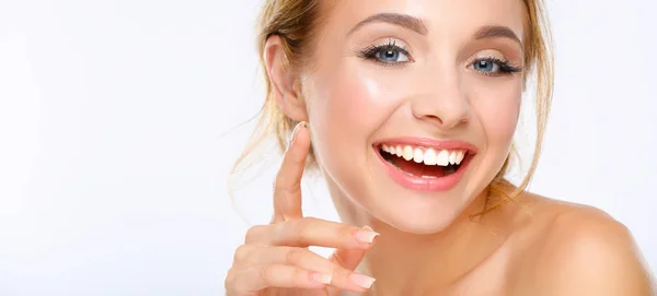 Young woman touching her face isolated on white background — Stock Photo, Image