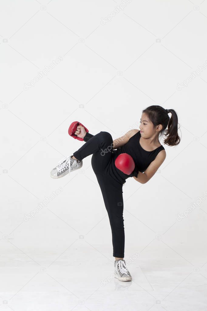 A girl with boxing gloves