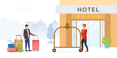 Otel kapıcısı bagaj için arabayı hazırlıyor.
