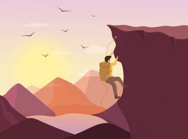 Dağcı kaya tırmanışı zirveye yaklaşıyor.