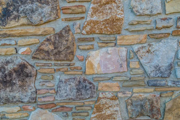 Stone masonry wall closeup background and textures — 스톡 사진