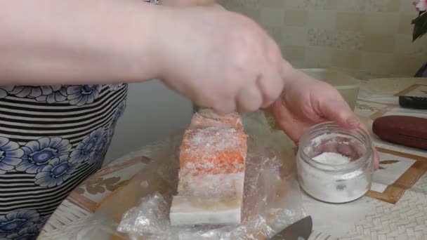 Woman Butchering Salting Fish Salmon — Stock Video