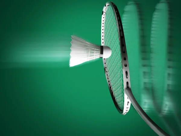 Racket with string and shuttlecock on green background — Stock Photo, Image