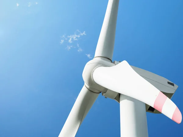 Big wind turbine on blue sky background — Stock Photo, Image