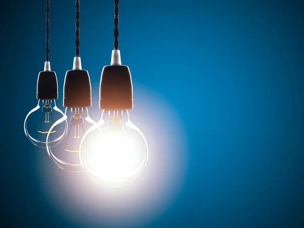 Close up shot on light bulb on the dark — Stock Photo, Image