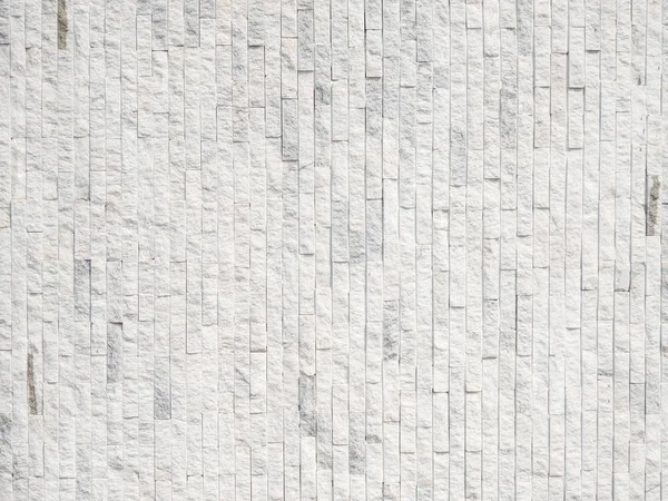 Белый брик, выложенный узором на стене — стоковое фото