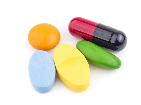 Super macro shot de Medicina: pastillas o cápsulas en blanco backgr —  Fotos de Stock