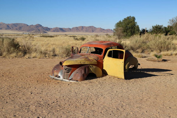 Abandoned car in the Namibian desert