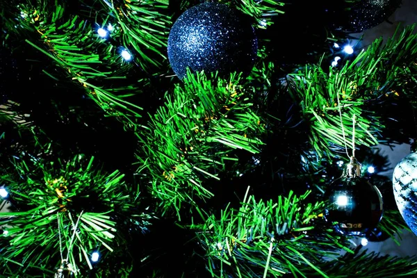 Christmas Blue Ball White Garland Lights Background Green Spruce Branches — 스톡 사진