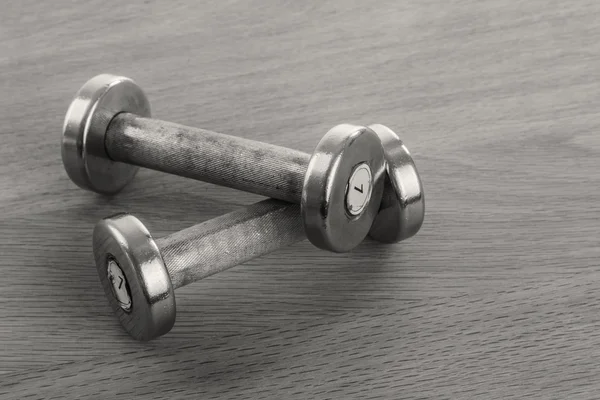 Dumbbells on the table — Stock Photo, Image