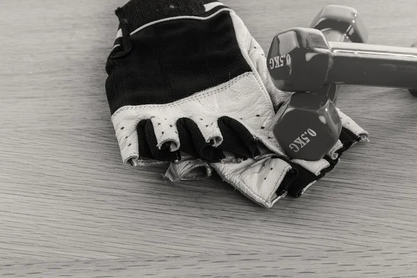 Dumbbells on the table — Stock Photo, Image