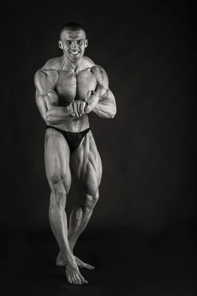 Embossed bodybuilder black and white photo — Stock Photo, Image