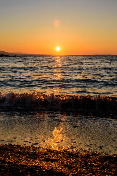 Sunset on the Greek coast — Stock Photo, Image