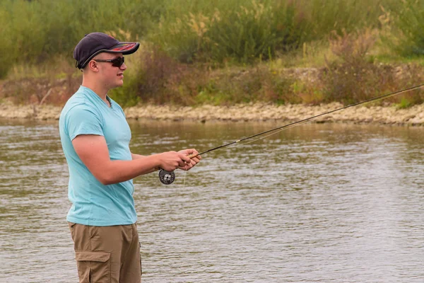 Fly fishing on the river — Stock Photo, Image