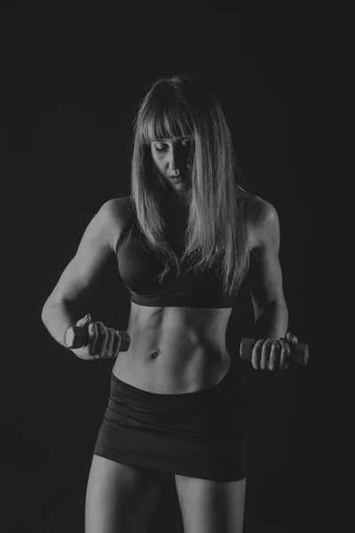 Mooie vrouwelijke lichaam in workout kleren — Stockfoto