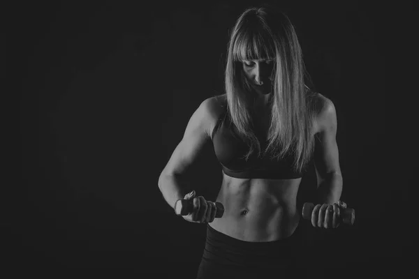 Mooie vrouwelijke lichaam in workout kleren — Stockfoto