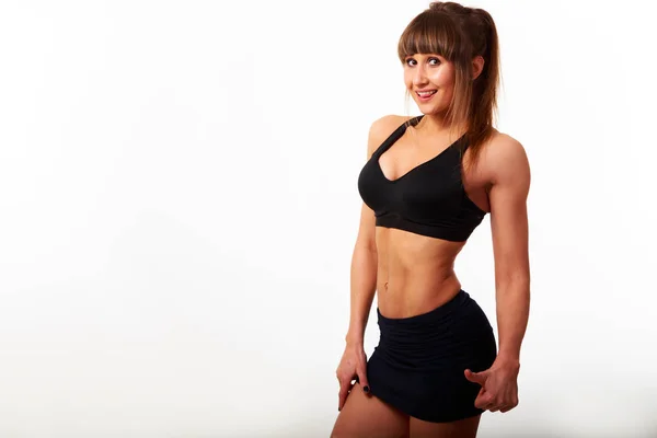 Muskulös ung kvinna idrottsman — Stockfoto